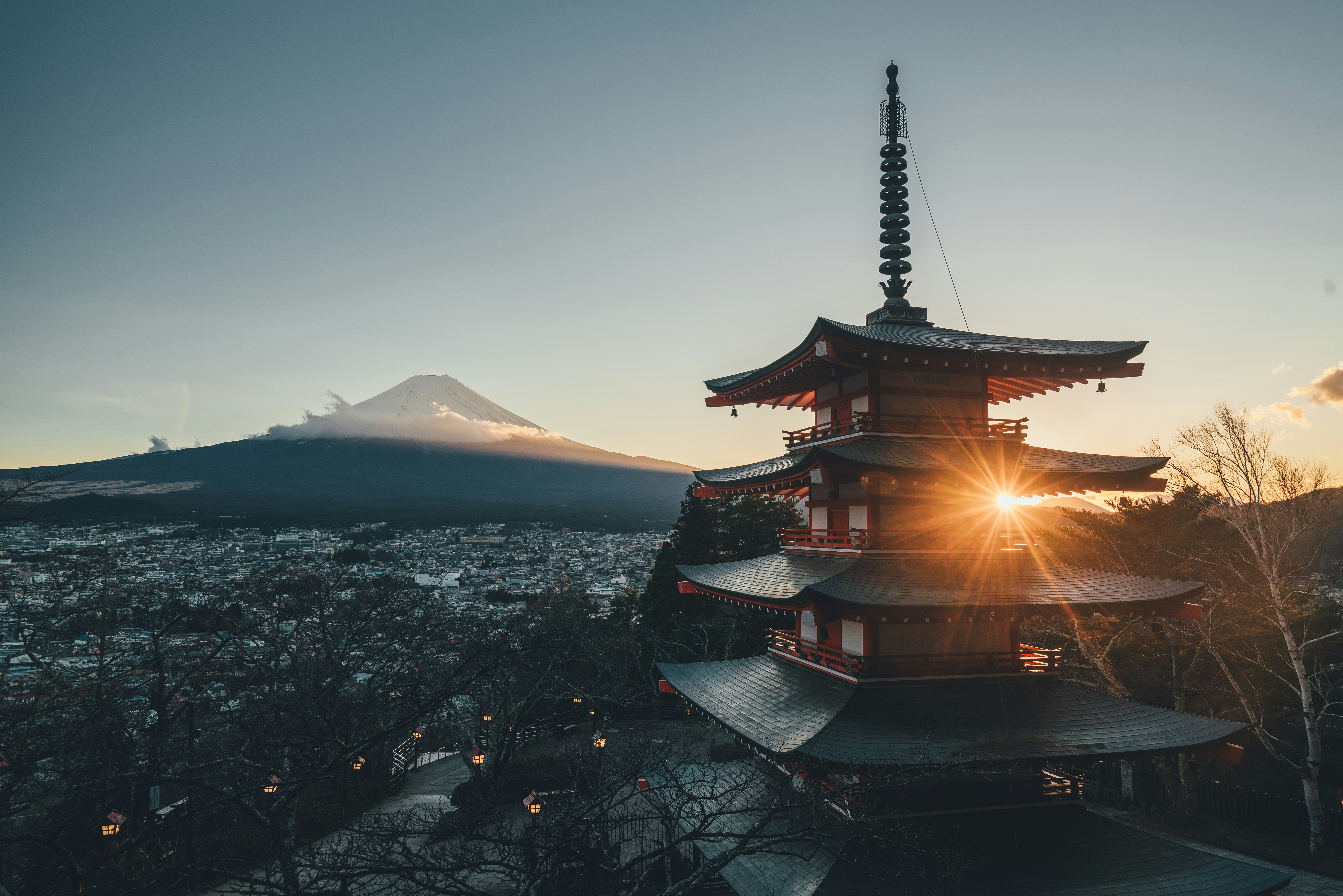 sunrise near a temple in japan