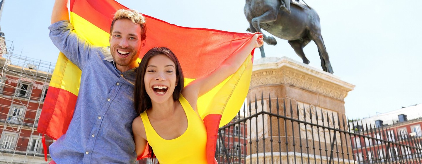 Happy couple with the Spanish flag