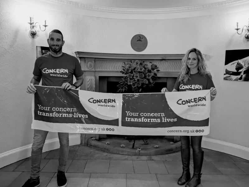 TEFL UK staff holding Concern support banner